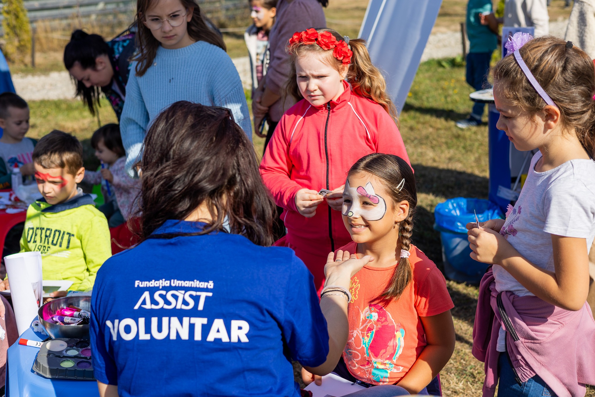 Children waiting to get face paintings